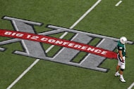 FILE - Baylor's Matt Ritchey stands by the Big 12 Conference logo on the field during the...