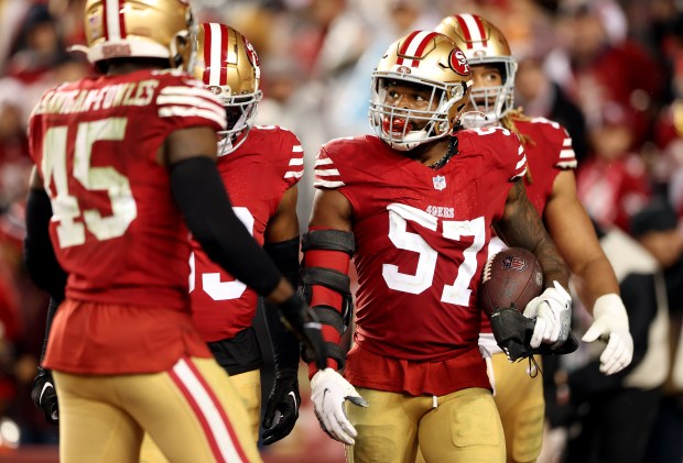 San Francisco 49ers' Dre Greenlaw (57) holds onto a pick in the third quarter against the Green Bay Packers in an NFC Divisional playoff game, Saturday, Jan. 20, 2024, at Levi's Stadium in Santa Clara, Calif. (Karl Mondon/Bay Area News Group)