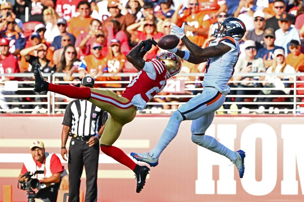 San Francisco 49ers' Darrell Luter Jr. (28) breaks up a pass intended for Denver Broncos' Courtland Sutton (14) in the second quarter of their NFL preseason game at Levi's Stadium in Santa Clara, Calif., on Saturday, Aug. 9, 2025. (Jose Carlos Fajardo/Bay Area News Group)