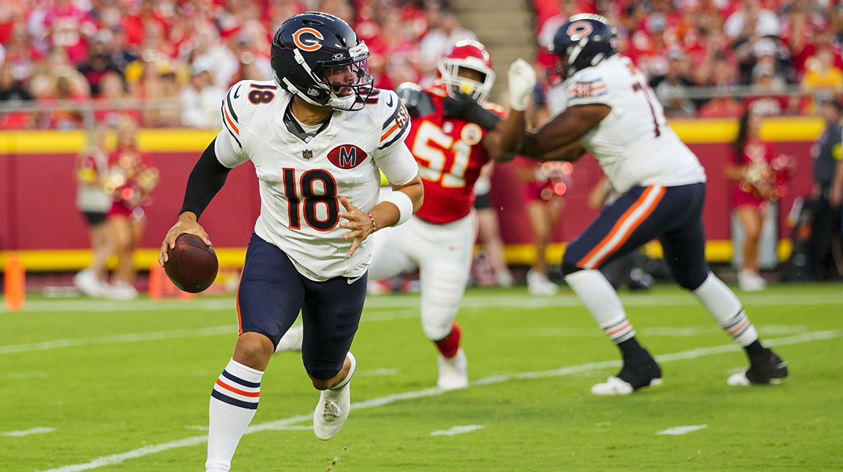Chicago Bears quarterback Caleb Williams (18) scrambles during the first half against the Kansas City Chiefs at GEHA Field at Arrowhead Stadium.
