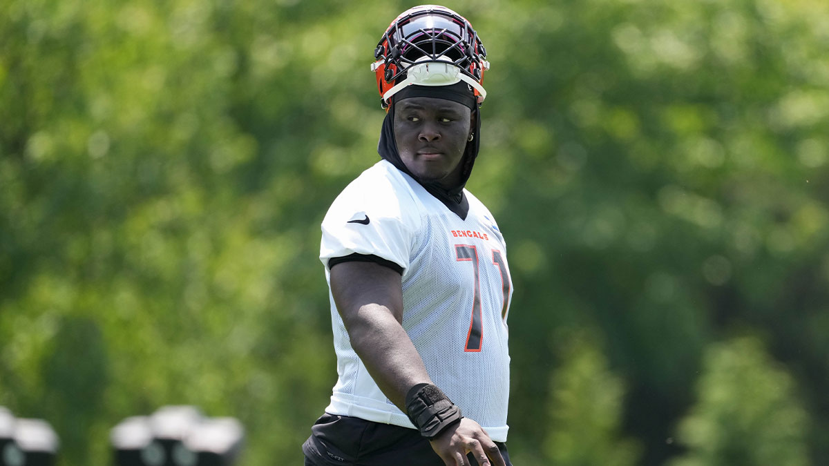 Cincinnati Bengals offensive tackle Amarius Mims (71) walks to the next drill during practice at Paycor Stadium.