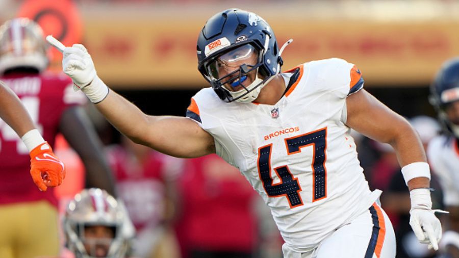 Karene Reid #47 of the Denver Broncos...