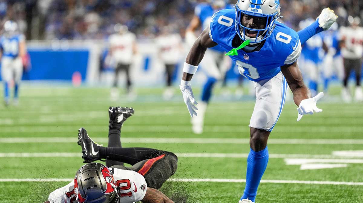 Detroit Lions cornerback Terrion Arnold (0) breaks a pass intended for Tampa Bay Buccaneers wide receiver Trey Palmer (10) during the first half at Ford Field in Detroit on Sunday, September 15, 2024.