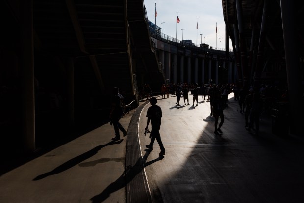 Fans walk through the concourse before the Chicago Bears play...