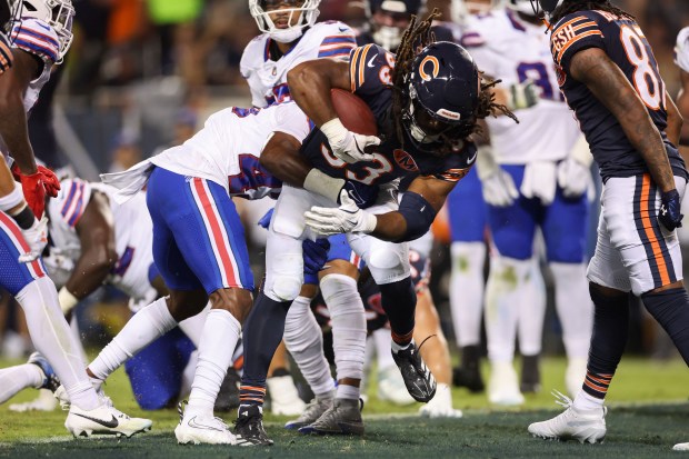 Chicago Bears running back Ian Wheeler (33) runs the ball...