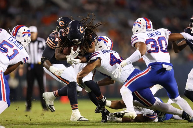 Chicago Bears running back Ian Wheeler (33) runs the ball...