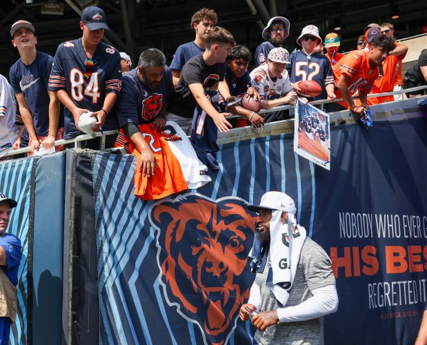 Chicago Bears quarterback Caleb Williams (18) walks out onto the field before the start of a game against the Miami Dophins at Soldier Field on Aug. 10, 2025, in Chicago. (Stacey Wescott/Chicago Tribune)