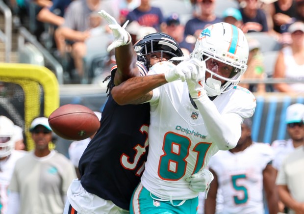 Chicago Bears cornerback Tre Flowers (37) knocks away a pass intended for Miami Dolphins wide receiver Theo Wease Jr. (81)in the second half during a game at Soldier Field on Aug. 10, 2025, in Chicago.The game ended in a 24-24 tie. (Stacey Wescott/Chicago Tribune)