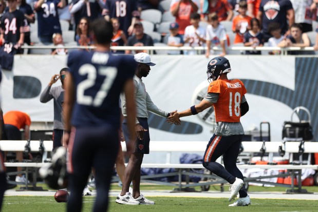 Chicago Bears quarterback Caleb Williams (18) jogs onto the field to warm up during Chicago Bears Family Fest at Soldier Field on Sunday, Aug. 3, 2025. (Eileen T. Meslar/Chicago Tribune)