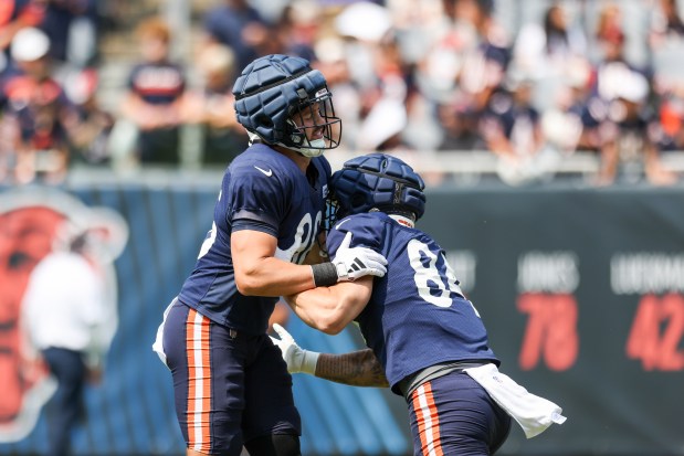 Chicago Bears tight ends Joel Wilson (86) and Colston Loveland (84) warm up during Chicago Bears Family Fest at Soldier Field on Sunday, Aug. 3, 2025. (Eileen T. Meslar/Chicago Tribune)