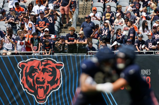 Fans watch Bears players warm up during Chicago Bears Family Fest at Soldier Field on Sunday, Aug. 3, 2025. (Eileen T. Meslar/Chicago Tribune)