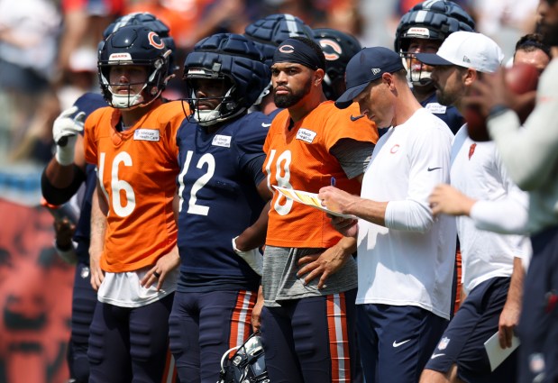 Chicago Bears quarterback Caleb Williams (18) stands next to Bears coach Ben Johnson on the field during Chicago Bears Family Fest at Soldier Field on Sunday, Aug. 3, 2025. (Eileen T. Meslar/Chicago Tribune)