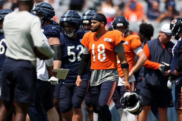 Chicago Bears quarterback Caleb Williams (18) walks on the field during Chicago Bears Family Fest at Soldier Field on Sunday, Aug. 3, 2025. (Eileen T. Meslar/Chicago Tribune)