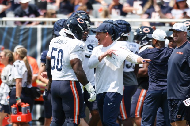 Chicago Bears coach Ben Johnson speaks to Chicago Bears defensive end Grady Jarrett (50) during Chicago Bears Family Fest at Soldier Field on Sunday, Aug. 3, 2025. (Eileen T. Meslar/Chicago Tribune)