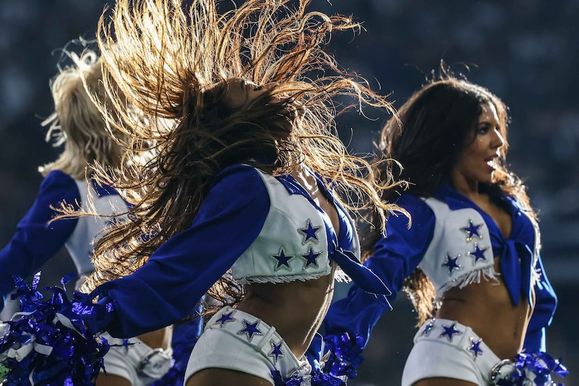 Dallas Cowboys' cheerleaders dance during a game against the New York Giants at AT&T stadium...