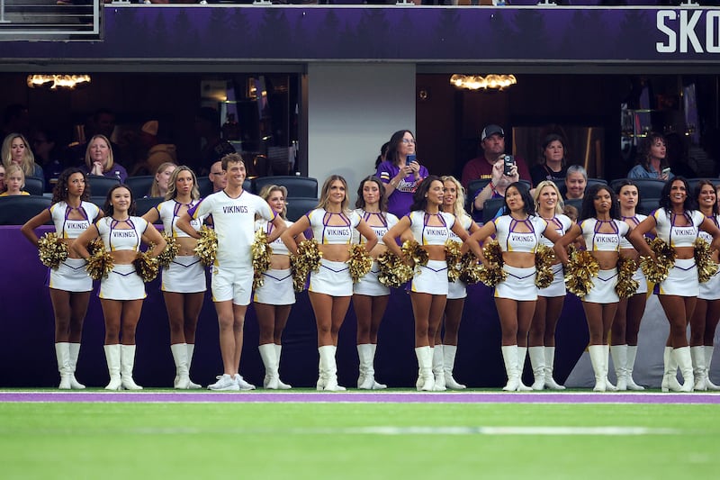 MINNEAPOLIS, MINNESOTA - AUGUST 16: Minnesota Vikings cheerleader Louie Conn lines up with cheerleaders in the first quarter during the NFL Preseason 2025 game between New England Patriots and Minnesota Vikings at U.S. Bank Stadium on August 16, 2025 in Minneapolis, Minnesota. (Photo by David Berding/Getty Images)