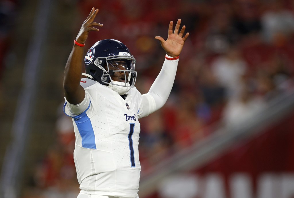 Cam Ward celebrates after leading the Titans to a second quarter touchdown in their 29-7 preseason road loss to the Buccaneers on Aug. 9, 2025.