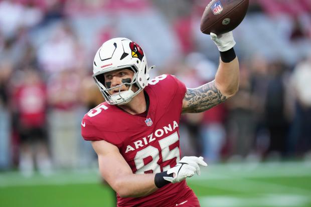 Arizona Cardinals tight end Trey McBride warms up prior to an NFL football game against the San Francisco 49ers Sunday, Jan. 5, 2025, in Glendale, Ariz. (AP Photo/Ross D. Franklin,File)