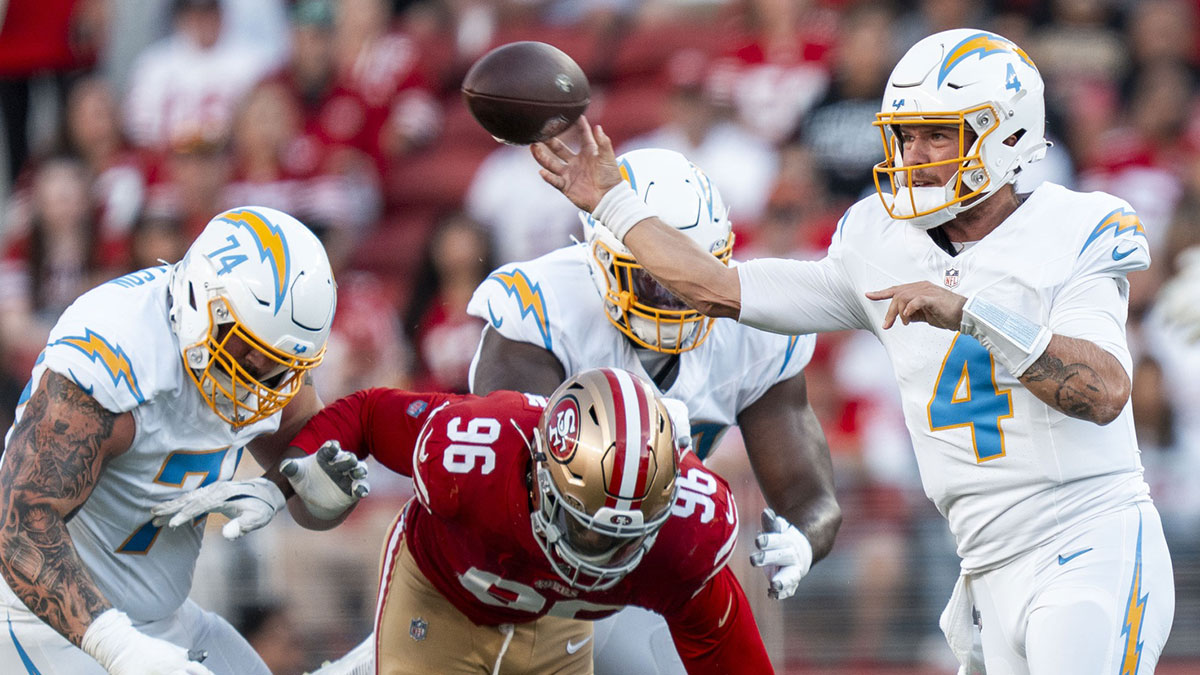 Los Angeles Chargers quarterback Taylor Heinicke (4) passes the football against San Francisco 49ers defensive end Jonathan Garvin (96) during the second quarter at Levi's Stadium.