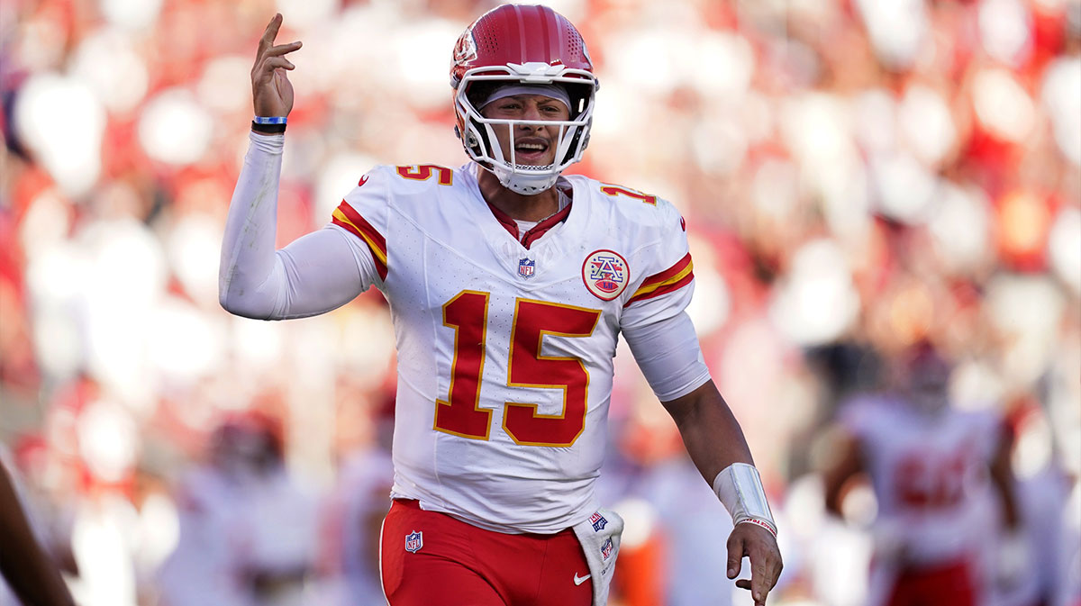 Kansas City Chiefs quarterback Patrick Mahomes (15) reacts after the Chiefs scored a touchdown against the San Francisco 49ers in the fourth quarter at Levi's Stadium.
