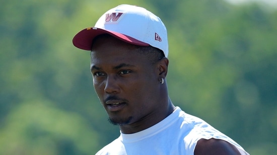 Washington Commanders wide receiver Terry McLaurin walks across the field after a practice at the team's NFL football training camp, Sunday, July 27, 2025, in Ashburn, Va. (AP Photo/Mark Schiefelbein)(AP)