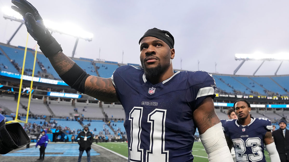 Dallas Cowboys linebacker Micah Parsons (11) walks off the field after the game at Bank of America Stadium.