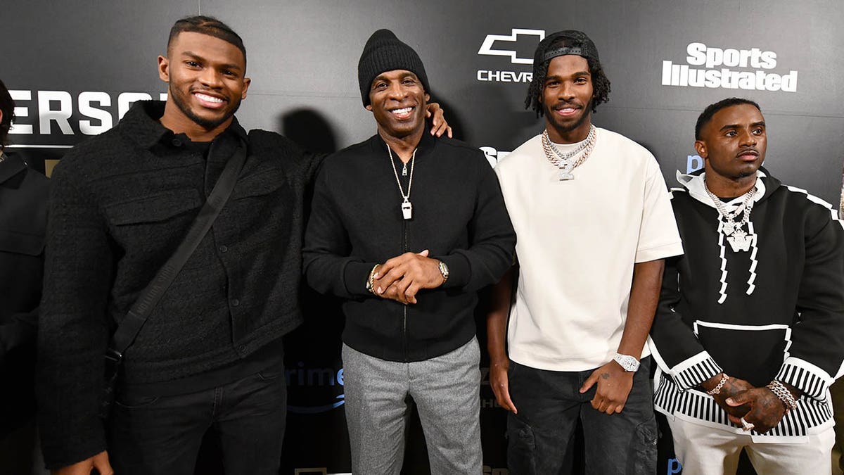 CU Football Players Shilo Sanders, University of Colorado Head Football Coach Deion Sanders, CU Football players Shedeur Sanders and Deion Sanders Jr at the 2023 Sport Illustrated Sportsperson Of The Year Award at the CU Events Center Dec. 06, 2023. 