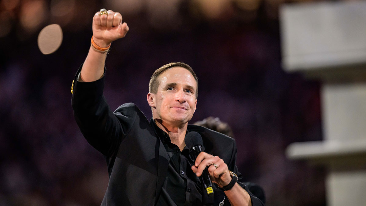 New Orleans Saints retired quarterback Drew Brees (9) reacts during his hall of fame ceremony at halftime against the Denver Broncos at Caesars Superdome