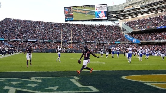 Chicago Bears Olamide Zaccheaus celebrates his touchdown reception against the Buffalo Bills at Soldier Field.(IMAGN IMAGES via Reuters Connect)
