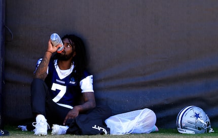 Dallas Cowboys cornerback Trevon Diggs recovers in the shade of the tower after pulling up...