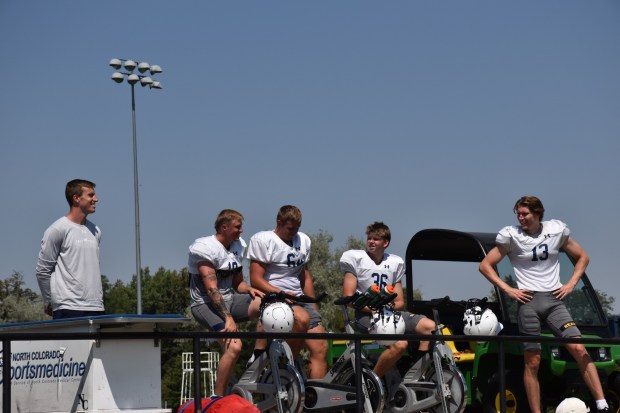 University of Northern Colorado football specialists, including placekicker Jacob Willig, second from left, watch the end of a Bears' preseason practice Tuesday, Aug. 5, 2025 after finishing their workout at a UNC practice field in Greeley. Willig, a redshirt senior transfer from CSU Pueblo, is in line to be the Bears' kicker for 2025 season, which starts Aug. 30. Willig is from Fort Collins and went to Rocky Mountain High School. (Anne Delaney/Staff Reporter).