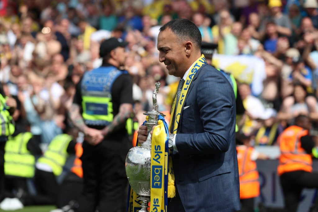 Paraag Marathe holds the Championship trophy at Plymouth.