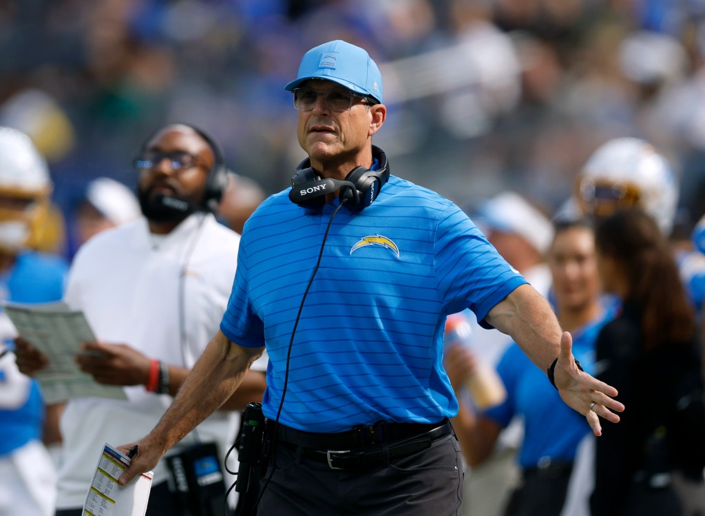 Chargers coach Jim Harbaugh on the sideline during a preseason game against the Rams on Aug. 16, 2025.