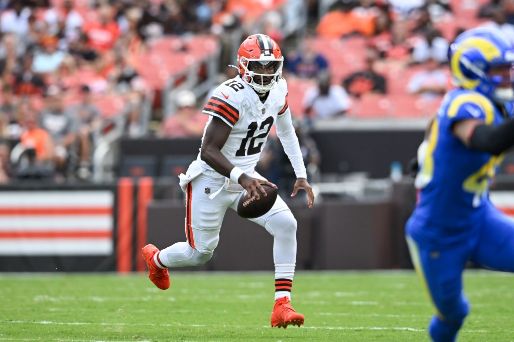Cleveland Browns quarterback running with the football.