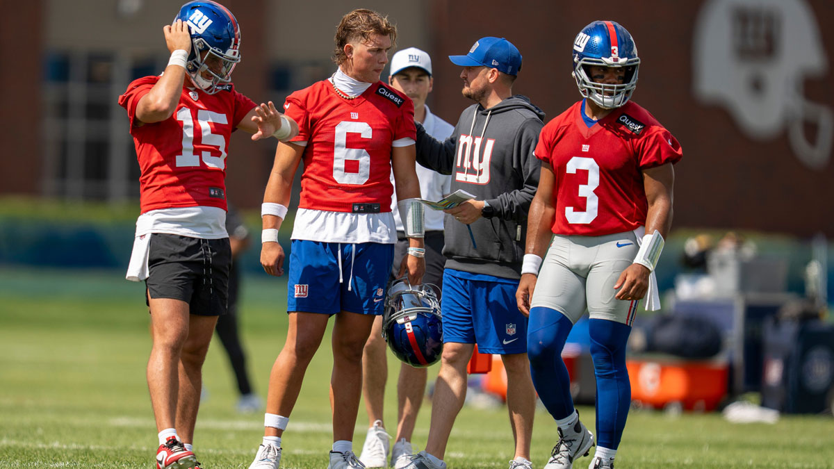 New York Giants quarterback Tommy DeVito (15), New York Giants quarterback Jaxson Dart (6), and New York Giants quarterback Russell Wilson (3) stand together during day one of the New York Giants training camp at Quest Diagnostics Giants Training Center in East Rutherford on Wednesday, July 23, 2025.