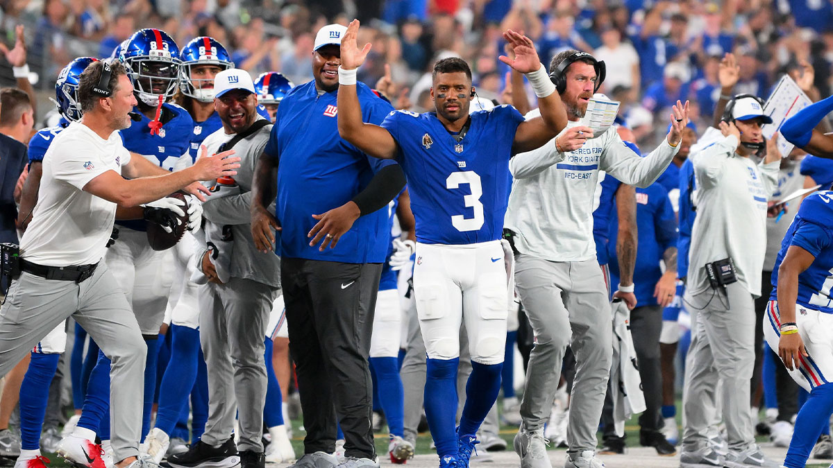 New York Giants quarterback Russell Wilson (3) gestures for a touchdown against the New York Jets during the second half at MetLife Stadium.