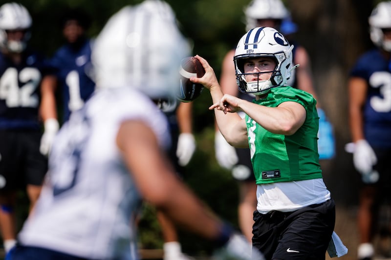 McCae Hillstead prepares to throw a pass during the first day of fall camp in Provo, Wednesday, July 30, 2025.