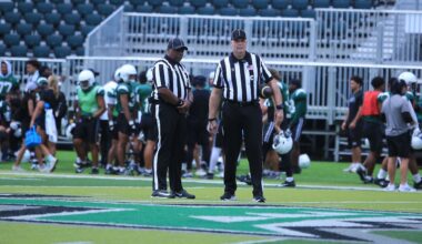 Two officials, part of a full crew assigned to oversee a Hawaii football scrimmage on Saturday, paused at midfield at the Clarence T.C. Ching Athletics Complex.