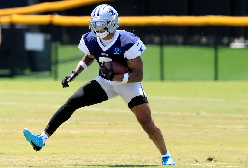 Dallas Cowboys safety Juanyeh Thomas (2) turns and heads up field after intercepting a pass...