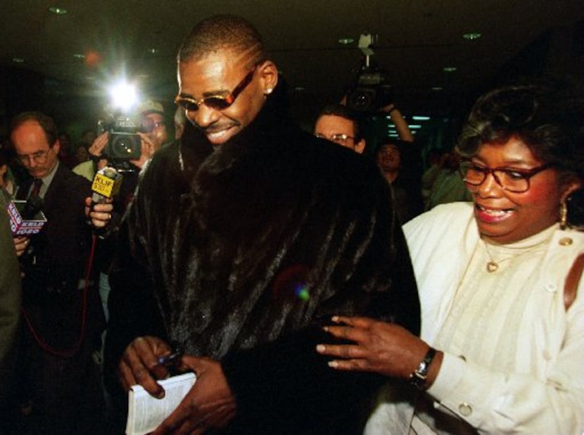 Michael Irvin leaves the Dallas grand jury room during his trial in March 1996.