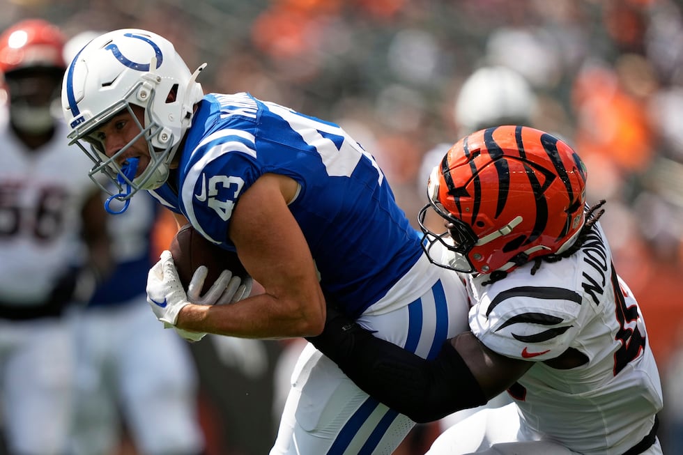 Indianapolis Colts wide receiver Tyler Kahmann (43) is tackled by Cincinnati Bengals' Maema...
