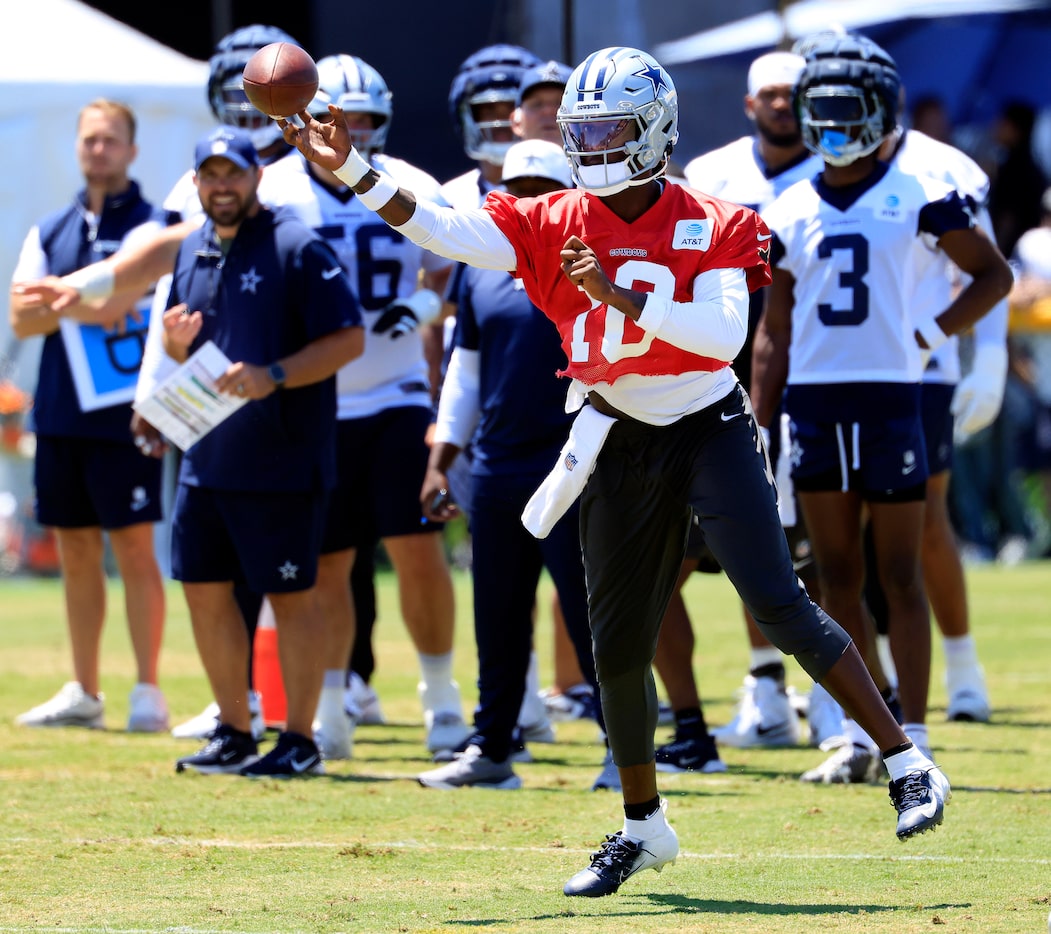 Dallas Cowboys quarterback Joe Milton (10) throws side-arm on the run during a non-padded...