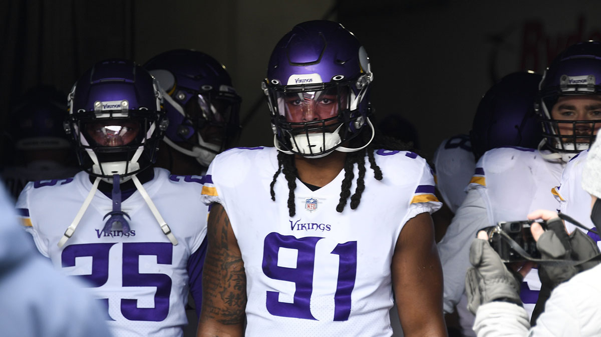 Minnesota Vikings linebacker Patrick Jones II (91) enters the field before the first half against the Chicago Bears at Soldier Field.