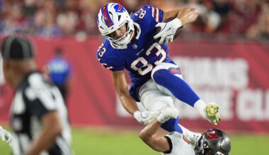 Buffalo Bills tight end Keleki Latu goes over Tampa Bay Buccaneers cornerback Roman Parodie during the second half of an NFL preseason football game, Saturday, Aug. 23, 2025, in Tampa, Fla. (AP Photo/Chris O'Meara)