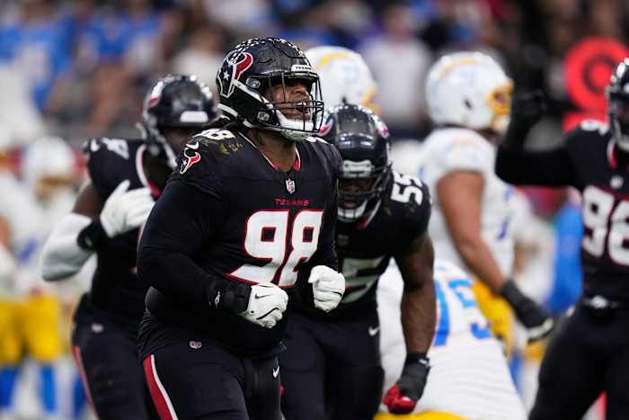 How Texans’ Tim Settle Jr. is ‘bringing my sledgehammer, lunch pail’ to the trenches