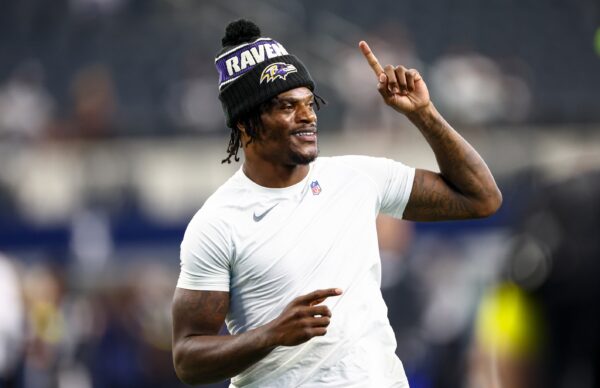 Aug 16, 2025; Arlington, Texas, USA; Baltimore Ravens quarterback Lamar Jackson (8) warms up before the game against the Dallas Cowboys at AT&T Stadium.