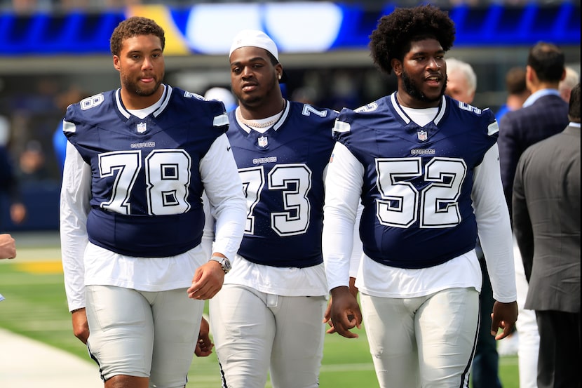 Dallas Cowboys offensive tackle Terence Steele (78), offensive tackle Tyler Smith (73) and...