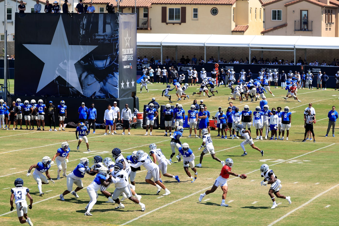 Dallas Cowboys quarterback Dak Prescott (4) hands the ball off to running back Javonte...