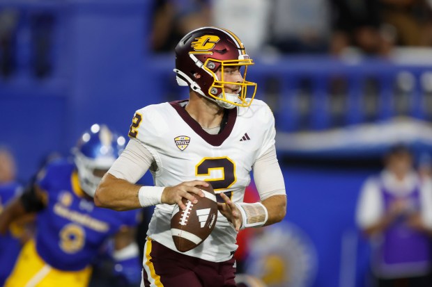 Central Michigan quarterback Joe Labas (2) looks to pass the...