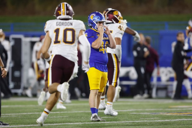 San Jose State place kicker Denis Lynch (48) reacts after...